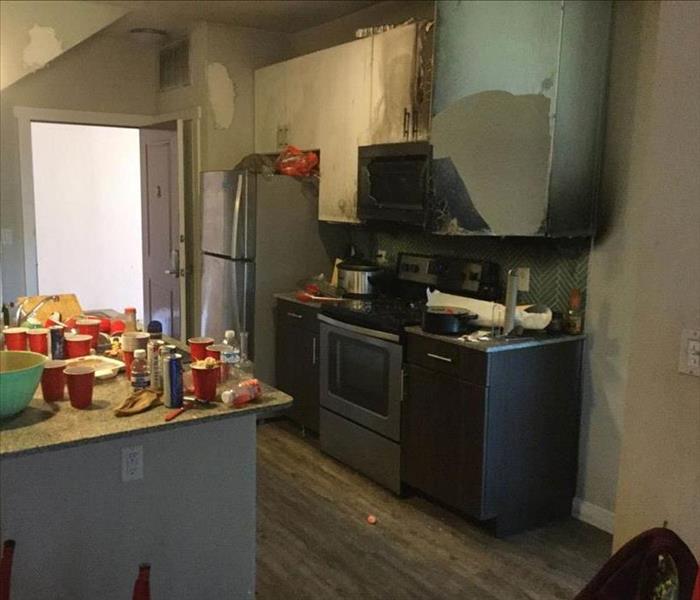 Fire damaged kitchen area.